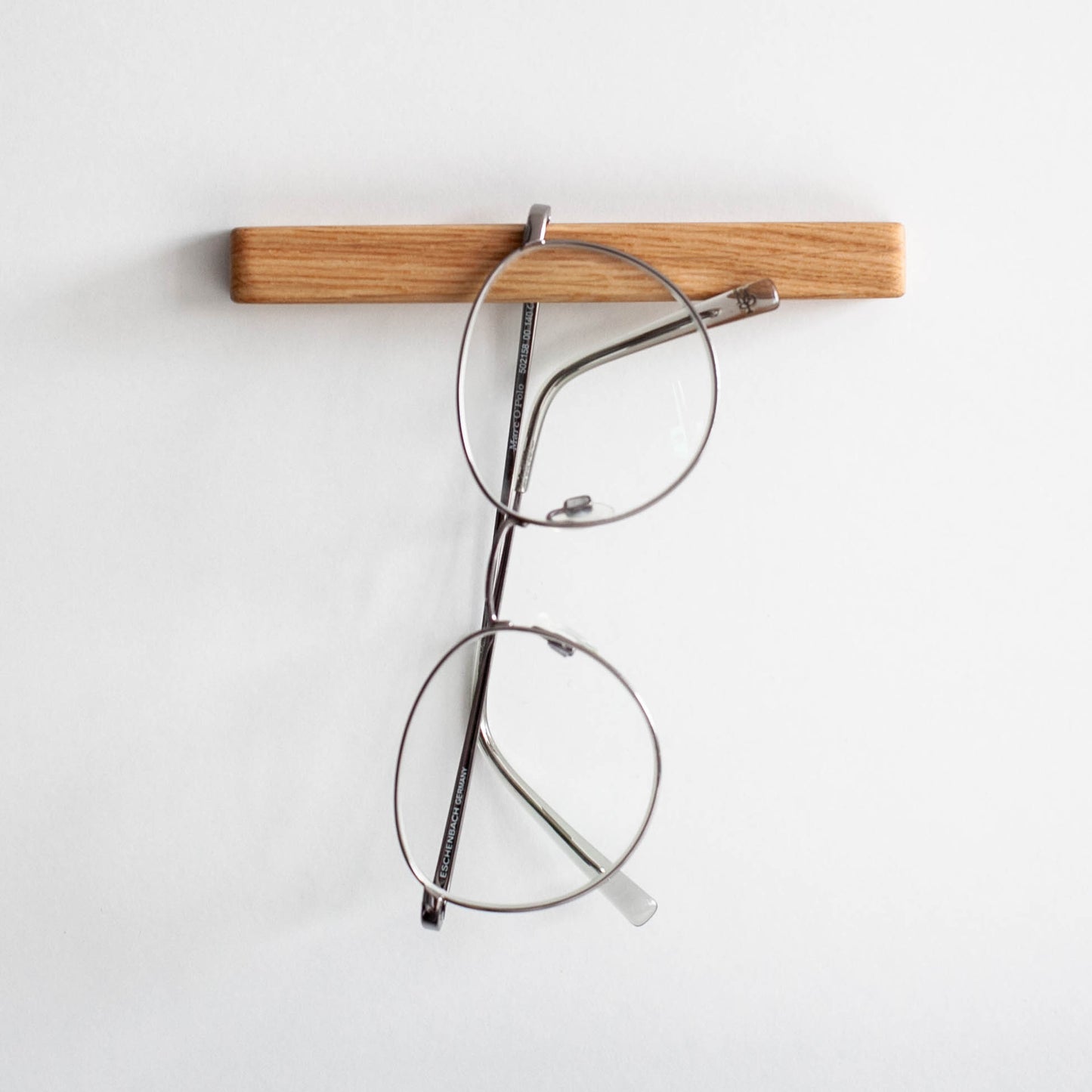 Eleganter Halter für Lesebrillen