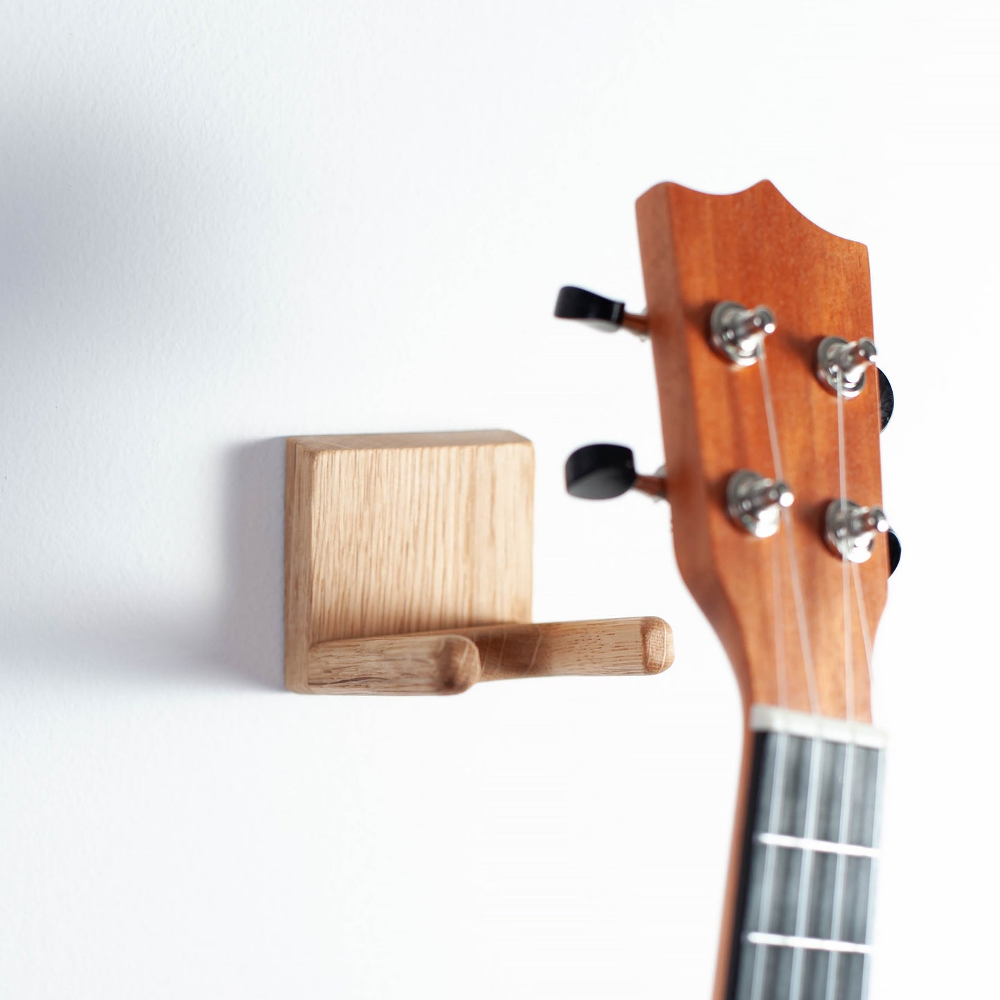 Ukulele wall mount made of solid oak wood