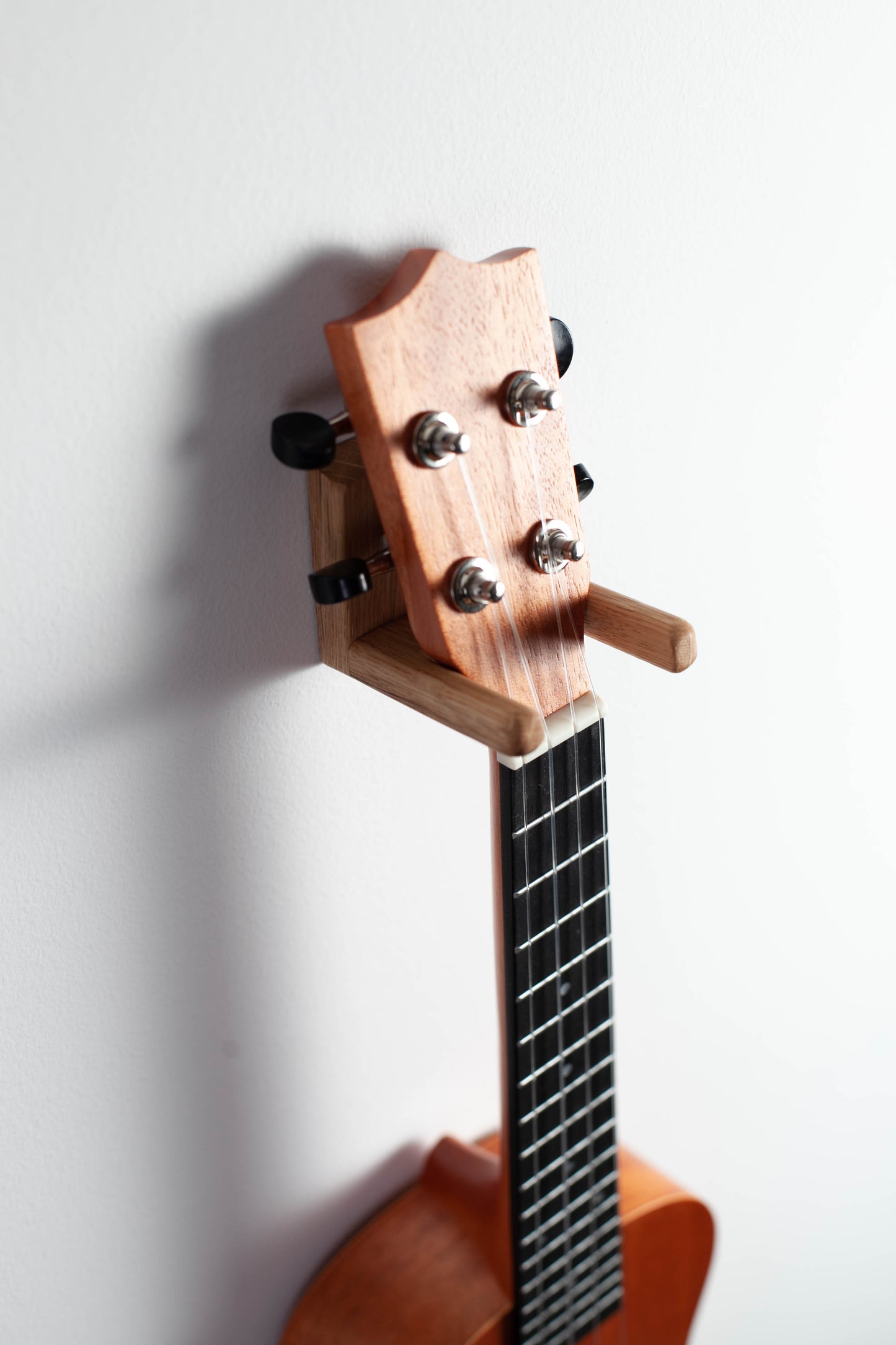 Ukulele wall mount made of solid oak wood