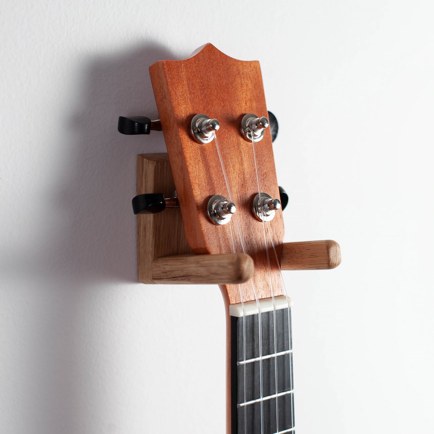 Ukulele wall mount made of solid oak wood