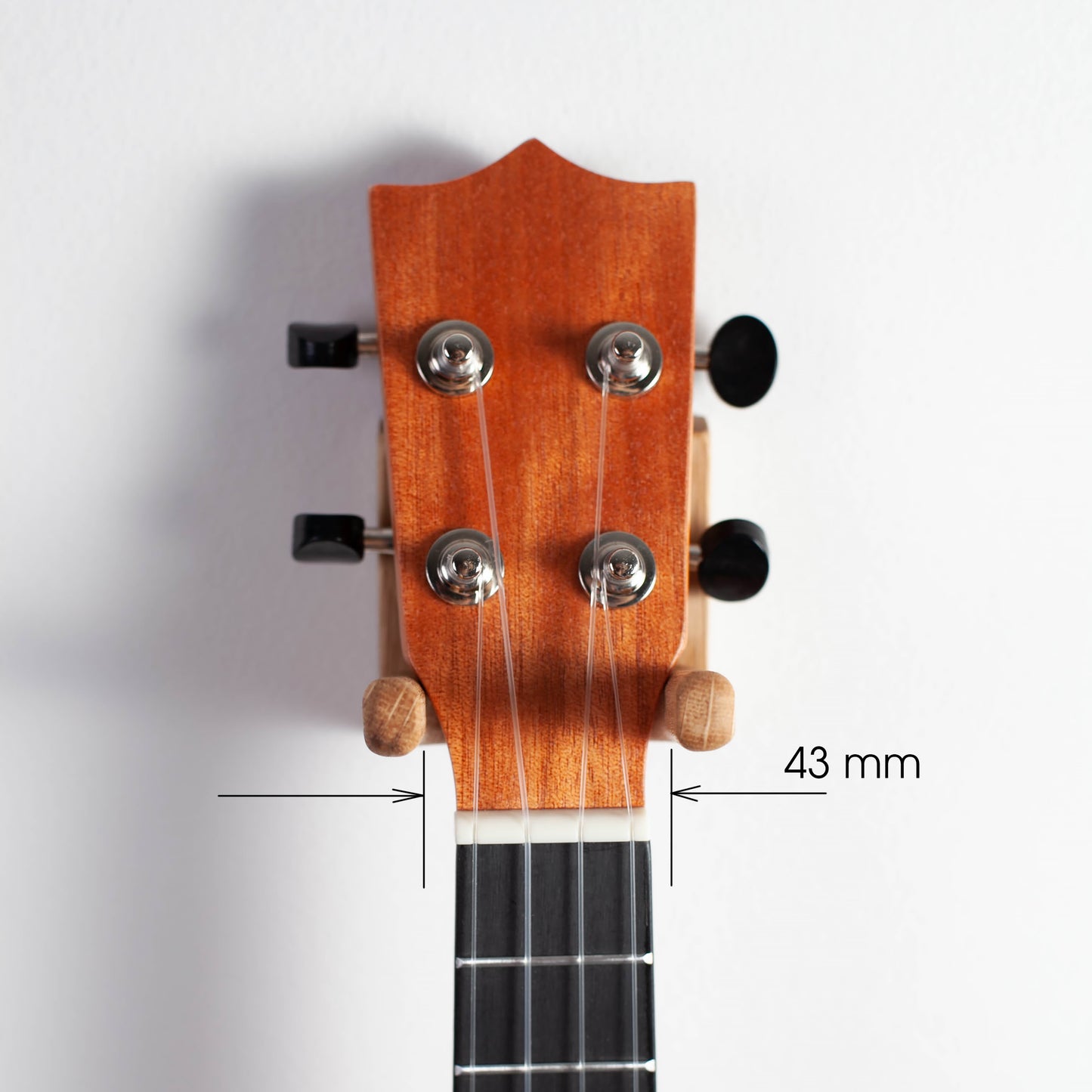 Ukulele wall mount made of solid oak wood